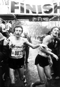 Dick+Beardsley+and+Inge+Simonsen+finish+the+London+Marathon+together.+Horace+Culter+of+the+Greater+London+council+one+of+the+men+who+made+this+race+possible+watches+on+in+the+background